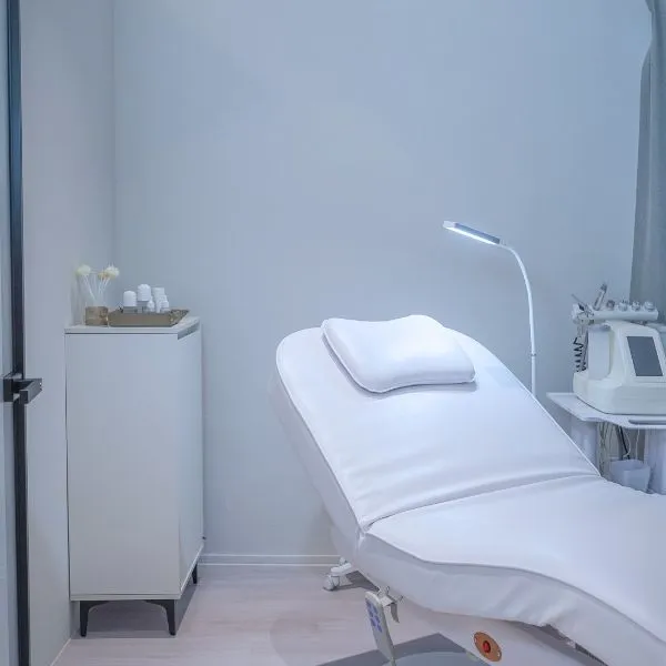 Gloss Skin Boutique Singapore Clinic Interior Adjustable Bed Treatment Room